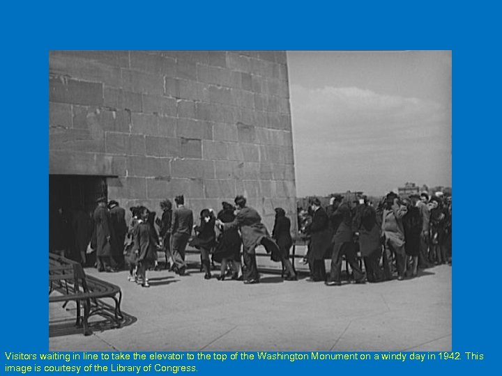 Visitors waiting in line to take the elevator to the top of the Washington