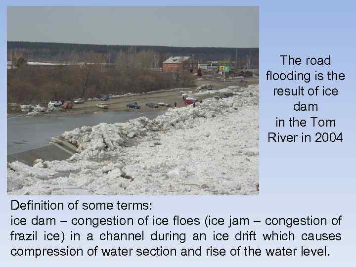 The road flooding is the result of ice dam in the Tom River in