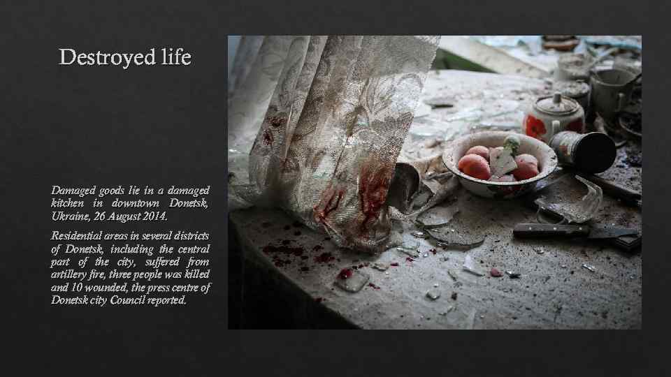 Destroyed life Damaged goods lie in a damaged kitchen in downtown Donetsk, Ukraine, 26