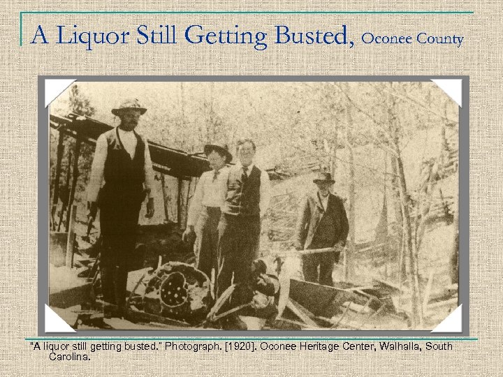A Liquor Still Getting Busted, Oconee County “A liquor still getting busted. ” Photograph.