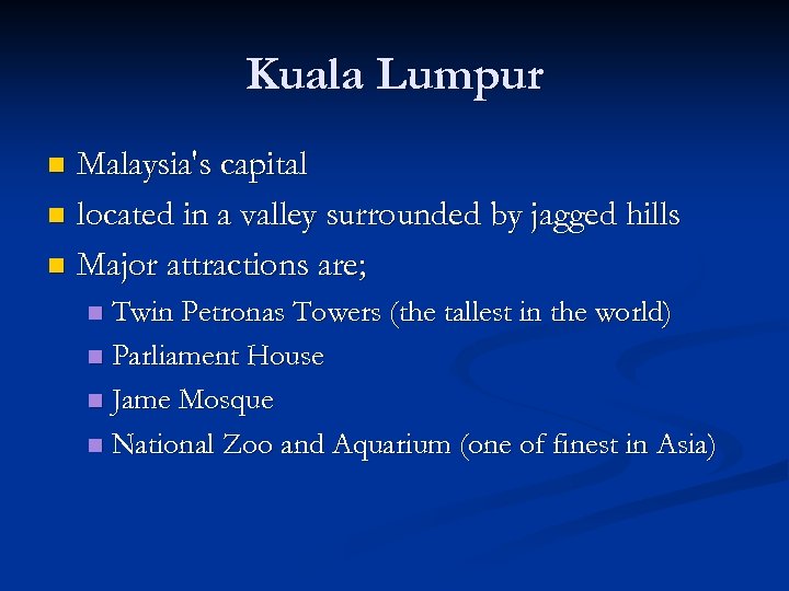 Kuala Lumpur Malaysia's capital n located in a valley surrounded by jagged hills n