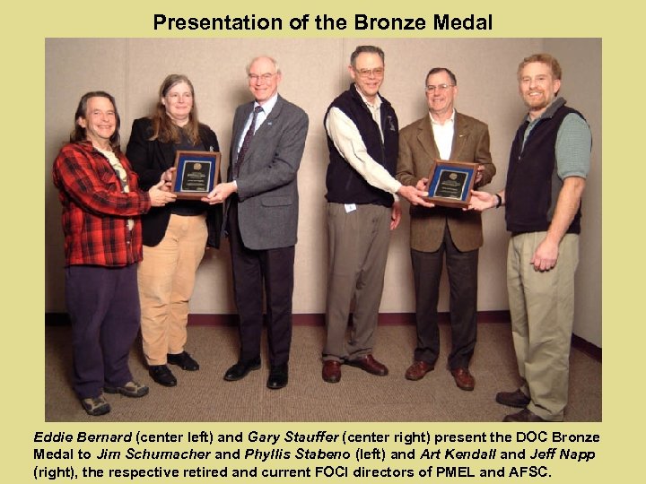 Presentation of the Bronze Medal Eddie Bernard (center left) and Gary Stauffer (center right)