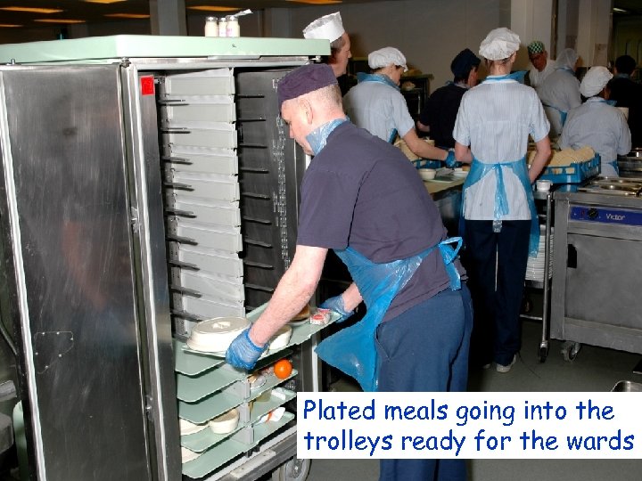 Plated meals going into the trolleys ready for the wards 