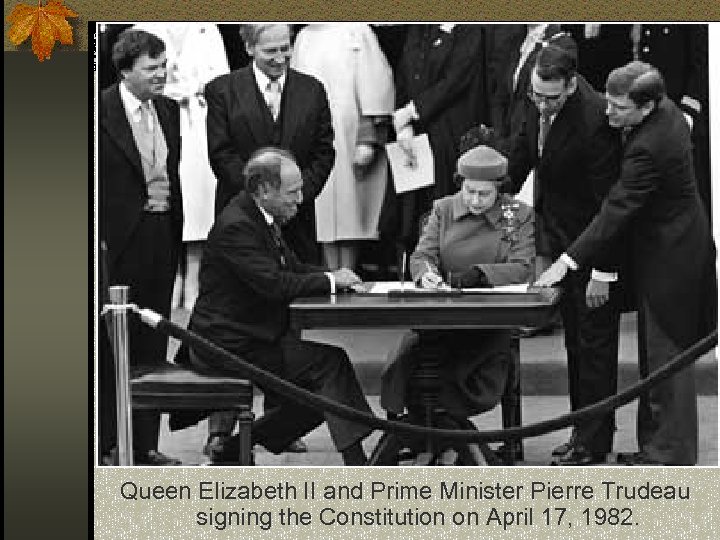 Queen Elizabeth II and Prime Minister Pierre Trudeau signing the Constitution on April 17,