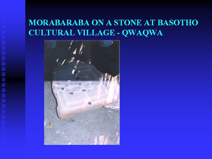 MORABA ON A STONE AT BASOTHO CULTURAL VILLAGE - QWAQWA 