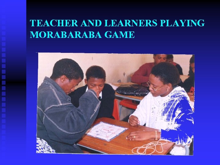 TEACHER AND LEARNERS PLAYING MORABA GAME 