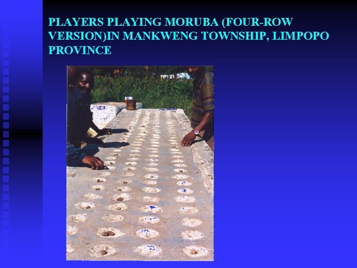 PLAYERS PLAYING MORUBA (FOUR-ROW VERSION)IN MANKWENG TOWNSHIP, LIMPOPO PROVINCE 