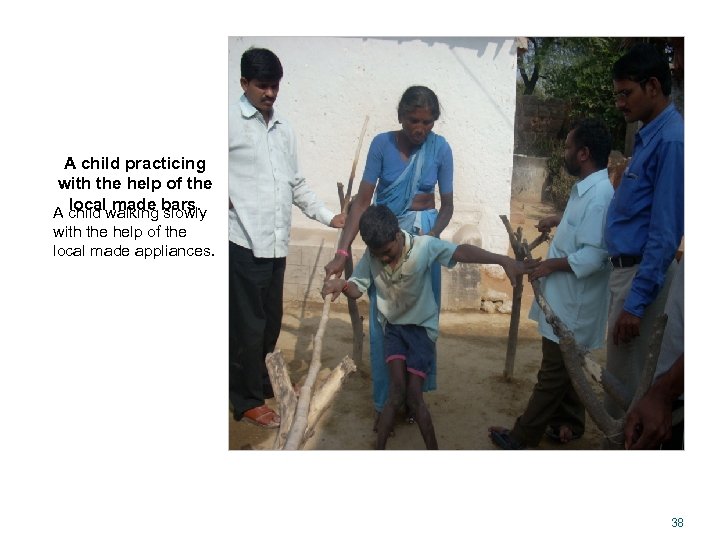 A child practicing with the help of the local made bars. A child walking