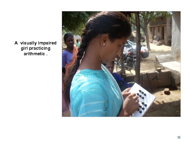 A visually impaired girl practicing arithmetic. 39 