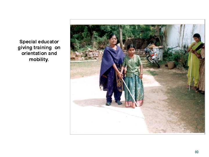 Special educator giving training on orientation and mobility. 60 