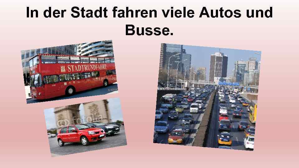 In der Stadt fahren viele Autos und Busse. 
