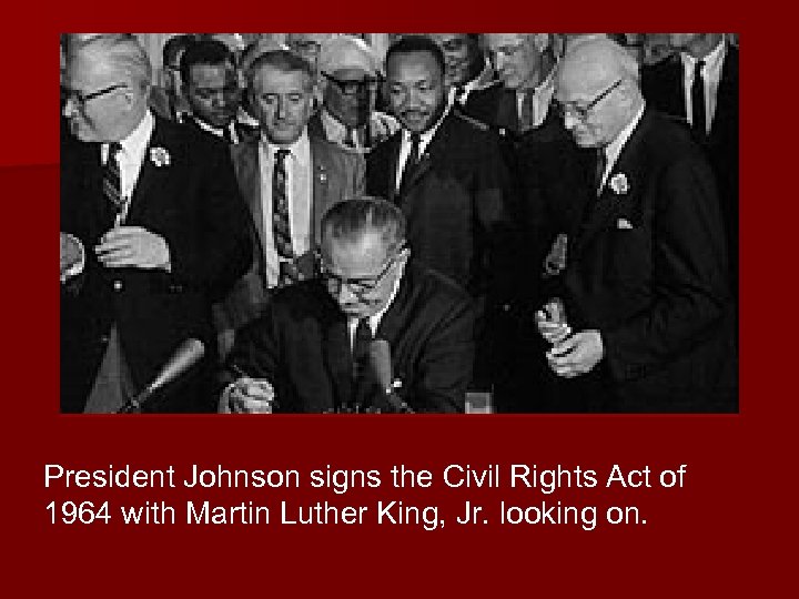 President Johnson signs the Civil Rights Act of 1964 with Martin Luther King, Jr.