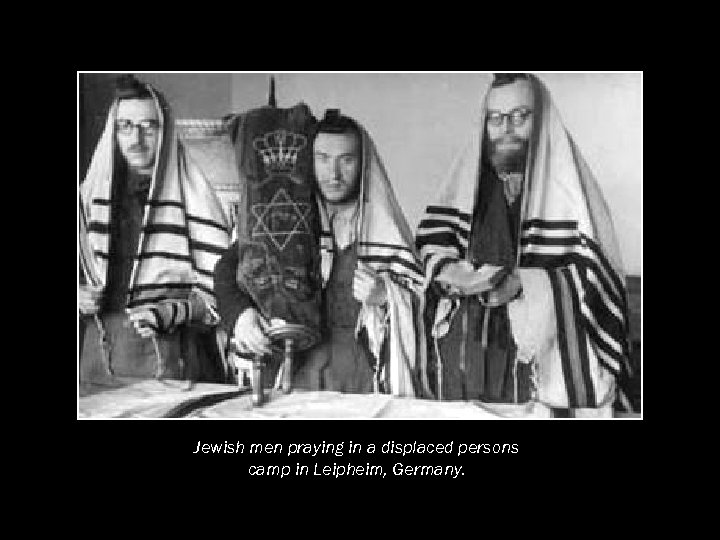 Jewish men praying in a displaced persons camp in Leipheim, Germany. 