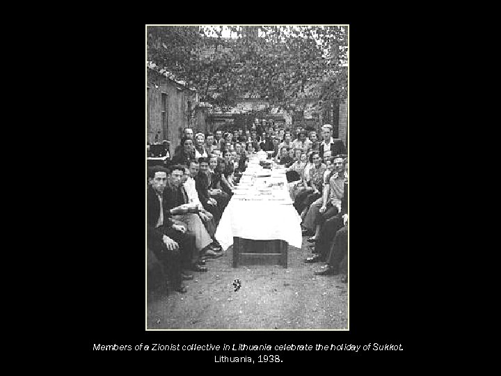 Members of a Zionist collective in Lithuania celebrate the holiday of Sukkot. Lithuania, 1938.