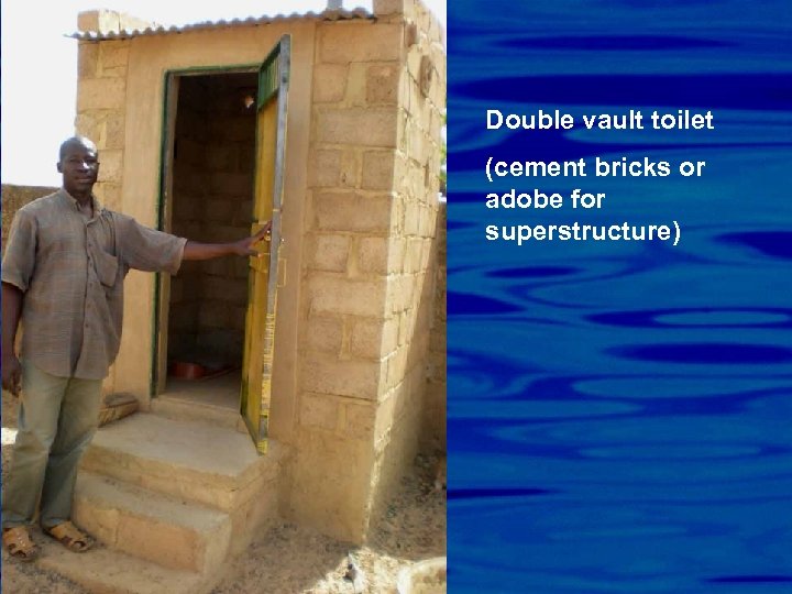 Double vault toilet (cement bricks or adobe for superstructure) 