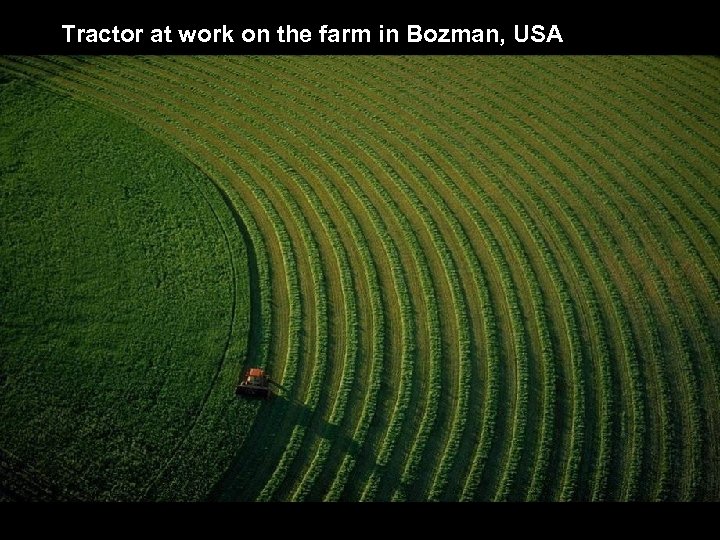 Tractor at work on the farm in Bozman, USA 