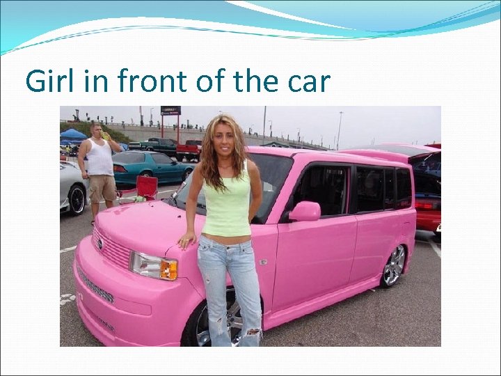 Girl in front of the car 
