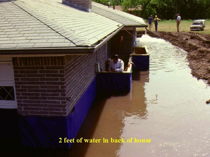 2 feet of water in back of house 