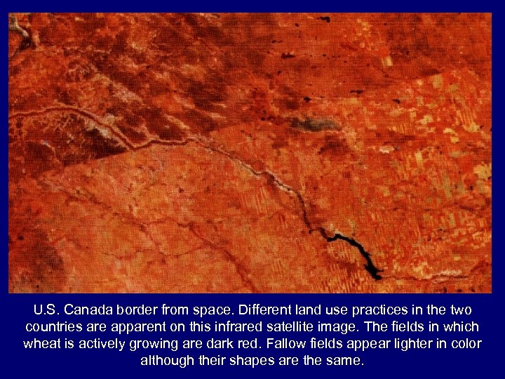 U. S. Canada border from space. Different land use practices in the two countries