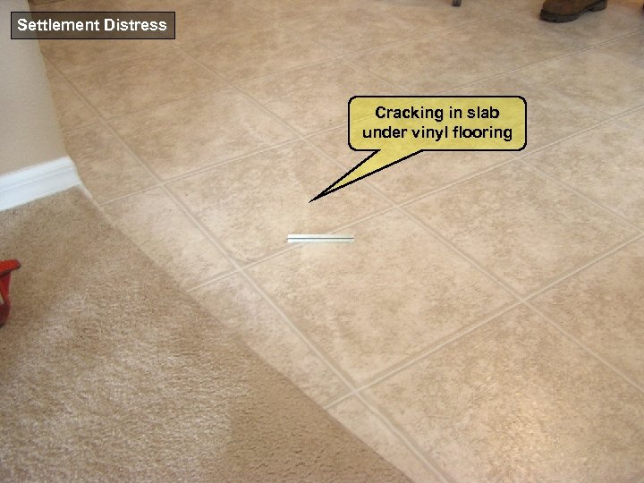 Settlement Distress Cracking in slab under vinyl flooring 