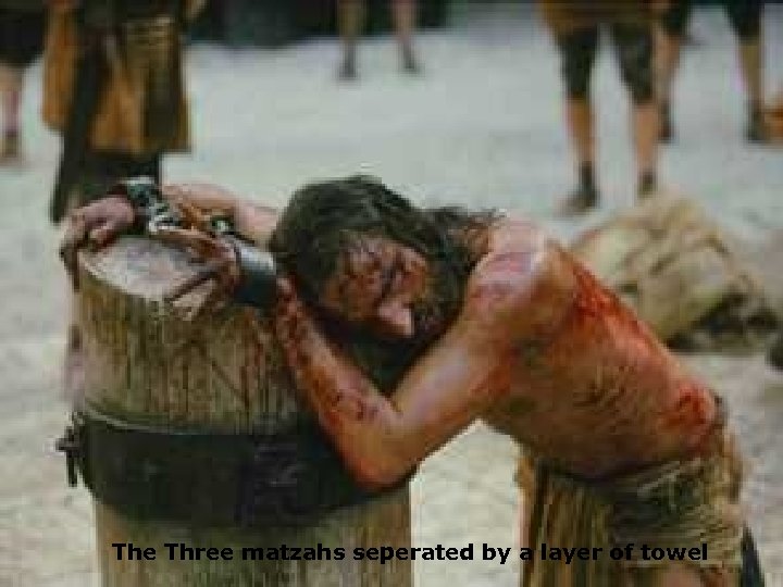 The Three matzahs seperated by a layer of towel 