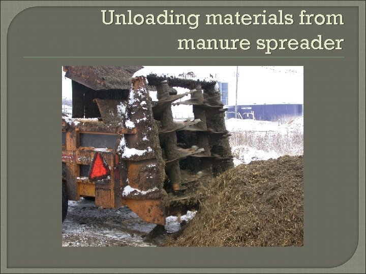 Unloading materials from manure spreader 