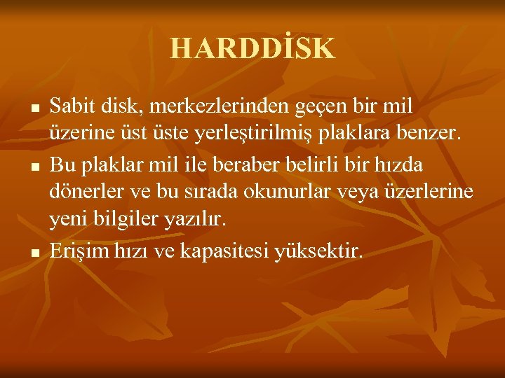 HARDDİSK n n n Sabit disk, merkezlerinden geçen bir mil üzerine üste yerleştirilmiş plaklara