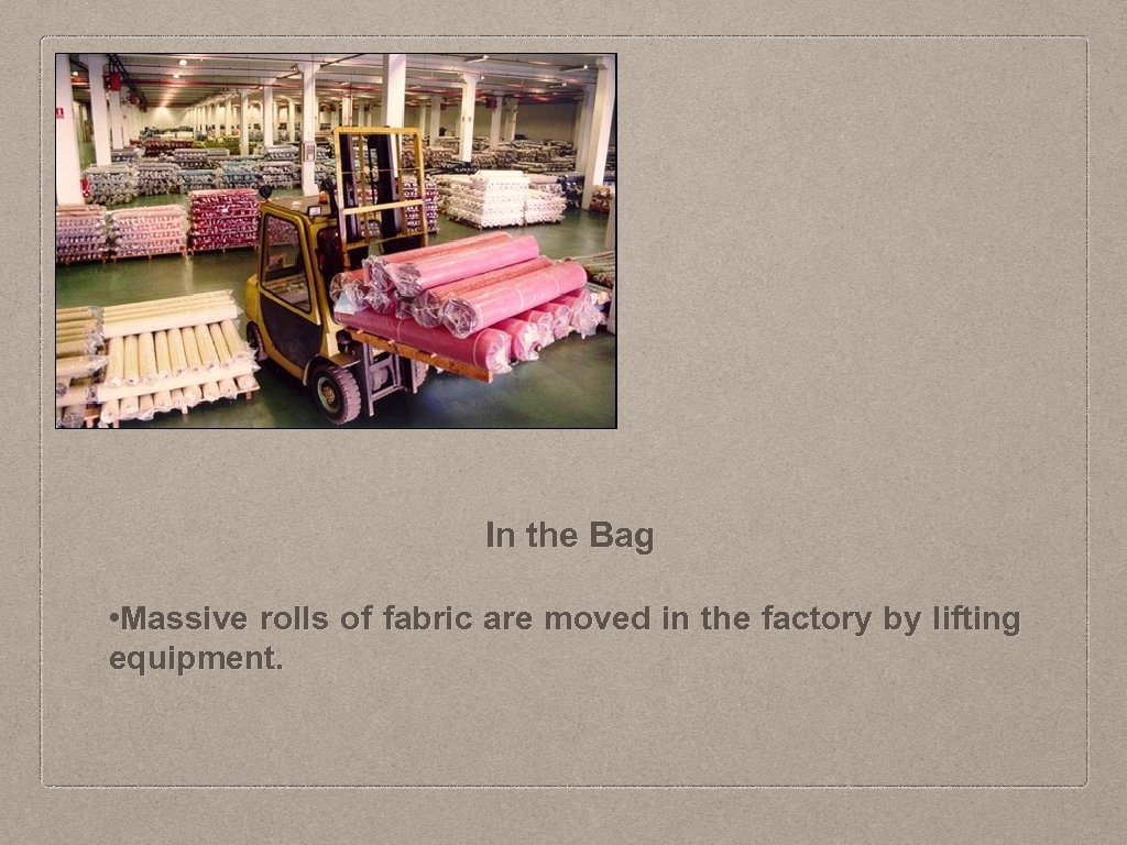 In the Bag • Massive rolls of fabric are moved in the factory by