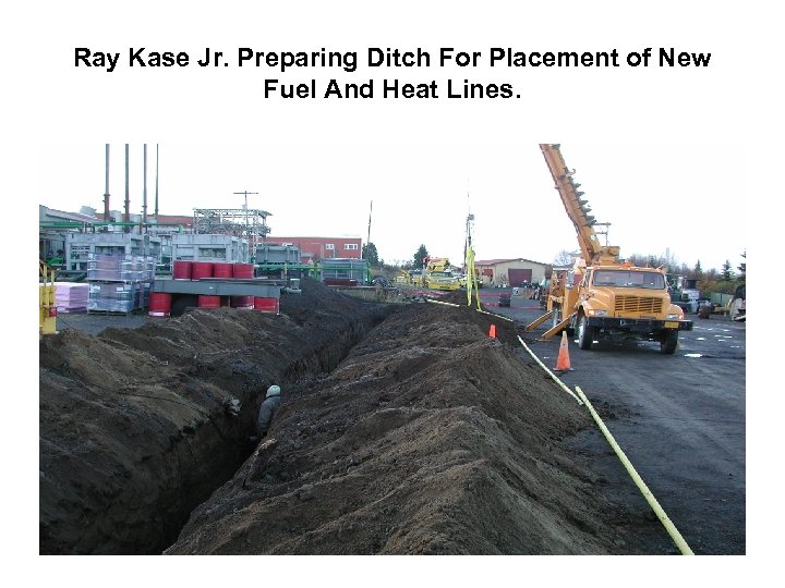 Ray Kase Jr. Preparing Ditch For Placement of New Fuel And Heat Lines. 