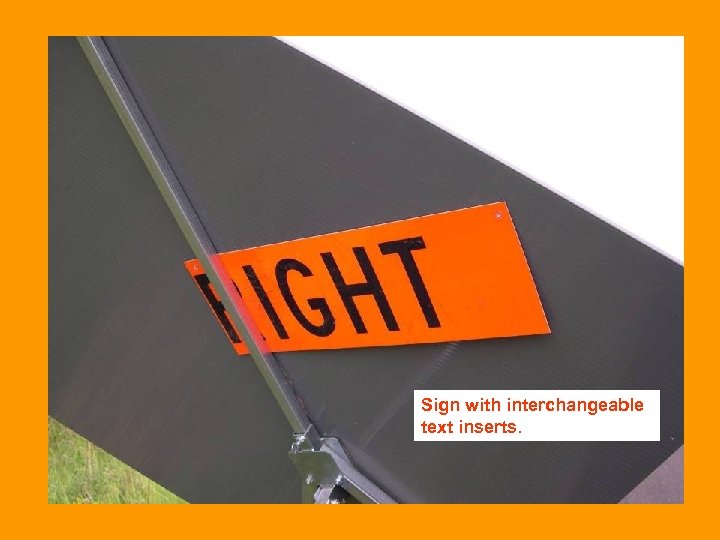 Sign with interchangeable text inserts. 