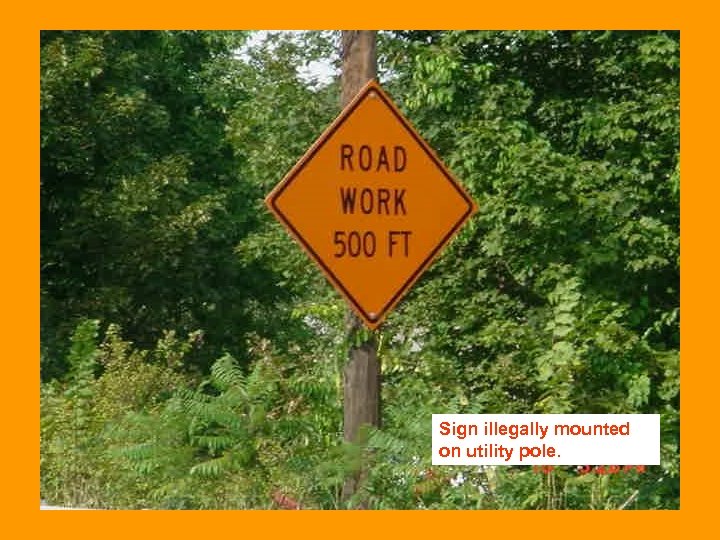 Sign illegally mounted on utility pole. 