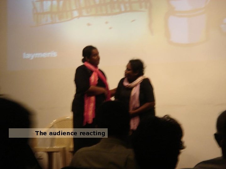 The audience reacting 