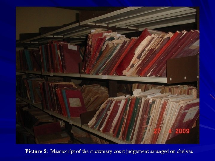 Picture 5: Manuscript of the customary court judgement arranged on shelves 