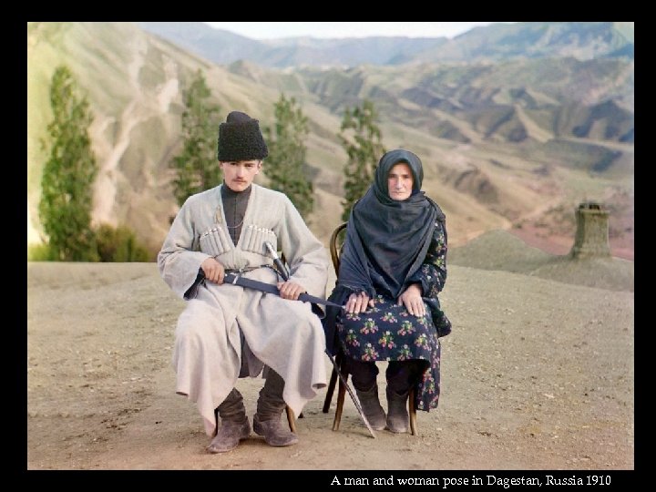 A man and woman pose in Dagestan, Russia 1910 