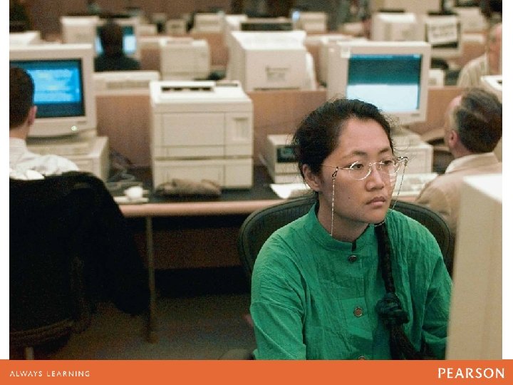 Yi Li, a graduate student from Taiwan, uses a computer terminal 