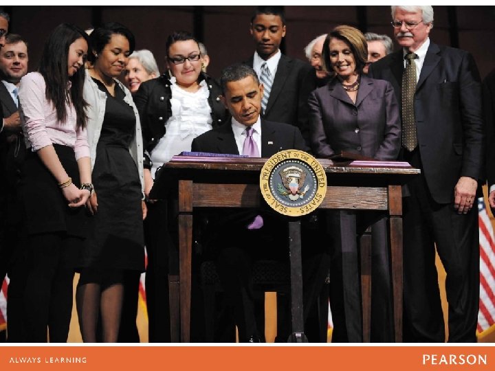 President Obama signing the Health Care and Education Reconciliation Act 