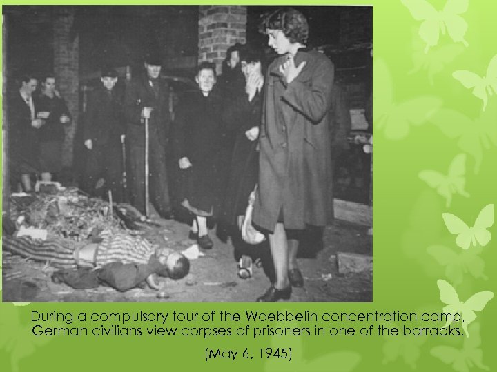 During a compulsory tour of the Woebbelin concentration camp, German civilians view corpses of