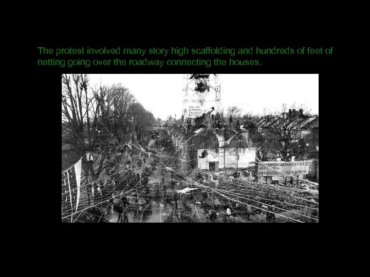 The protest involved many story high scaffolding and hundreds of feet of netting going