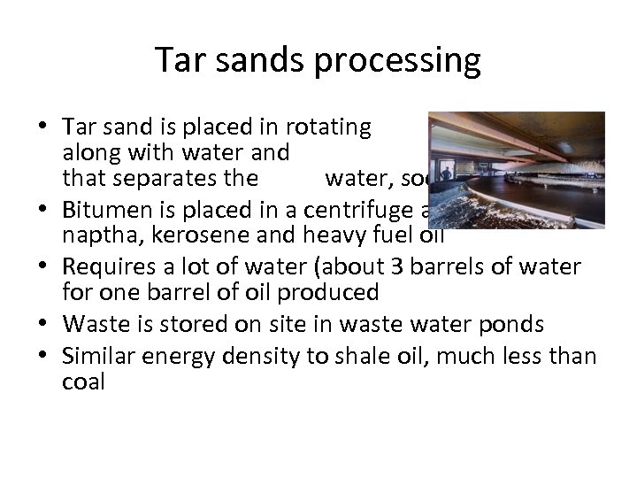 Tar sands processing • Tar sand is placed in rotating drums along with water