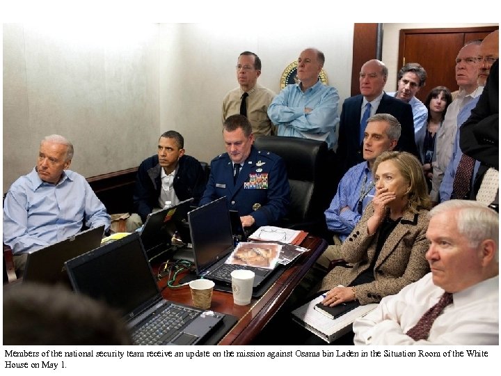 Members of the national security team receive an update on the mission against Osama