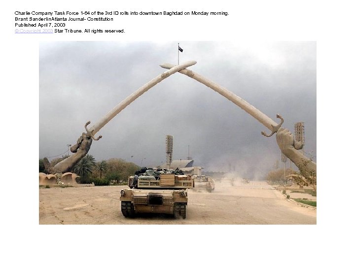 Charlie Company Task Force 1 -64 of the 3 rd ID rolls into downtown