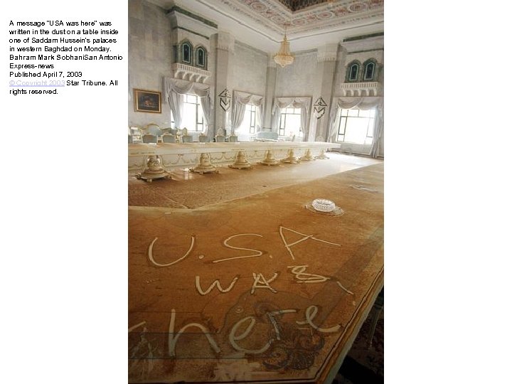 A message "USA was here" was written in the dust on a table inside