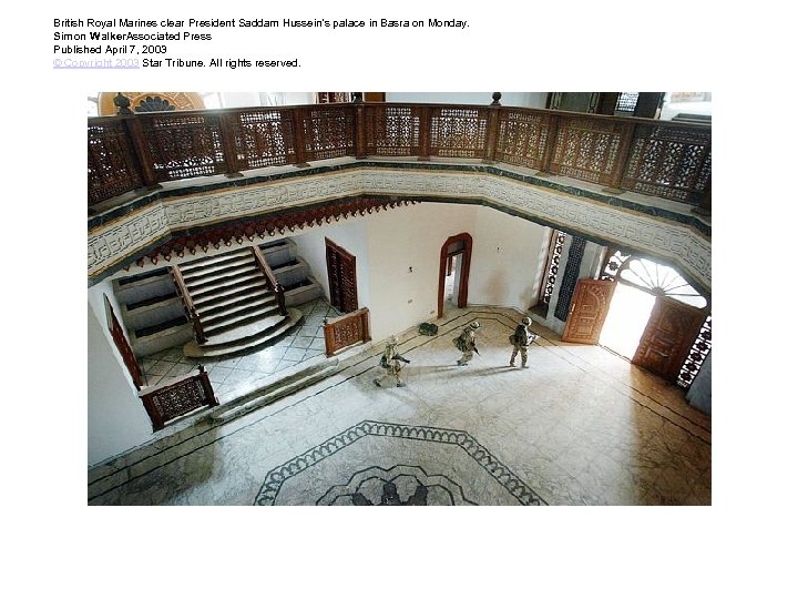 British Royal Marines clear President Saddam Hussein's palace in Basra on Monday. Simon Walker.