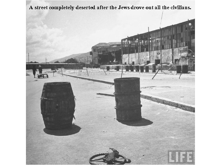 A street completely deserted after the Jews drove out all the civilians. 