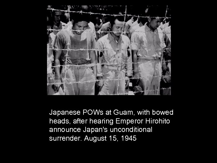 Japanese POWs at Guam, with bowed heads, after hearing Emperor Hirohito announce Japan's unconditional