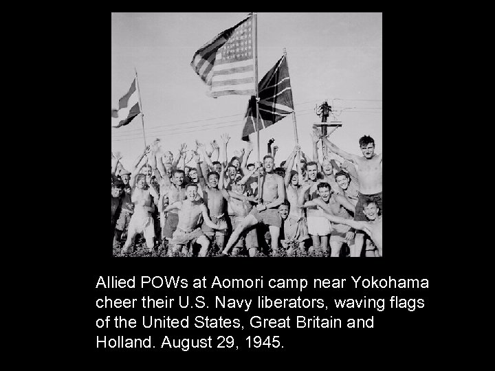 Allied POWs at Aomori camp near Yokohama cheer their U. S. Navy liberators, waving