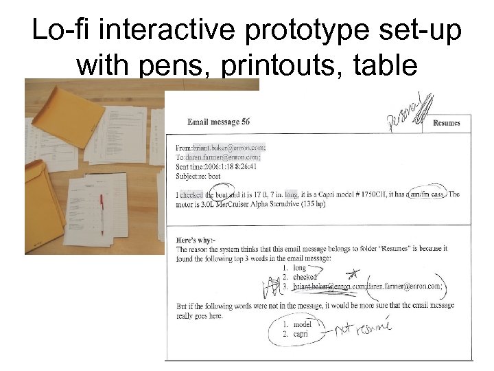 Lo-fi interactive prototype set-up with pens, printouts, table 