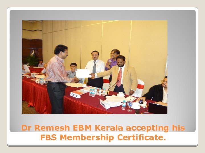 Dr Remesh EBM Kerala accepting his FBS Membership Certificate. 