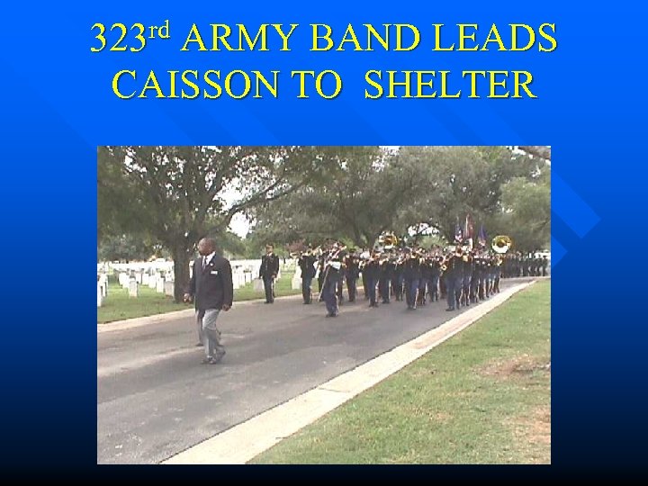323 rd ARMY BAND LEADS CAISSON TO SHELTER 