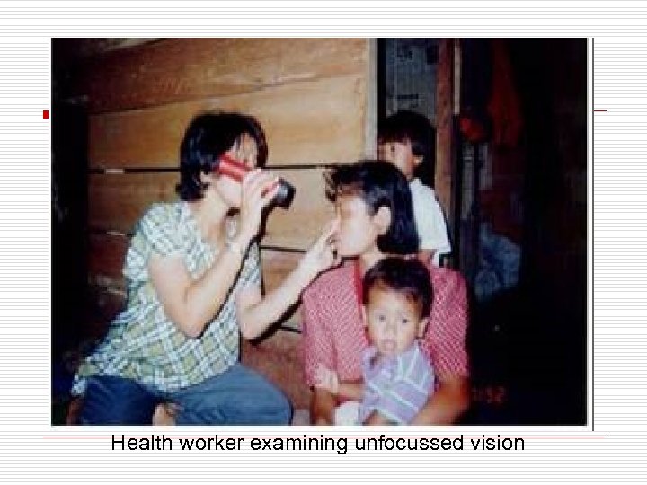 Health worker examining unfocussed vision 